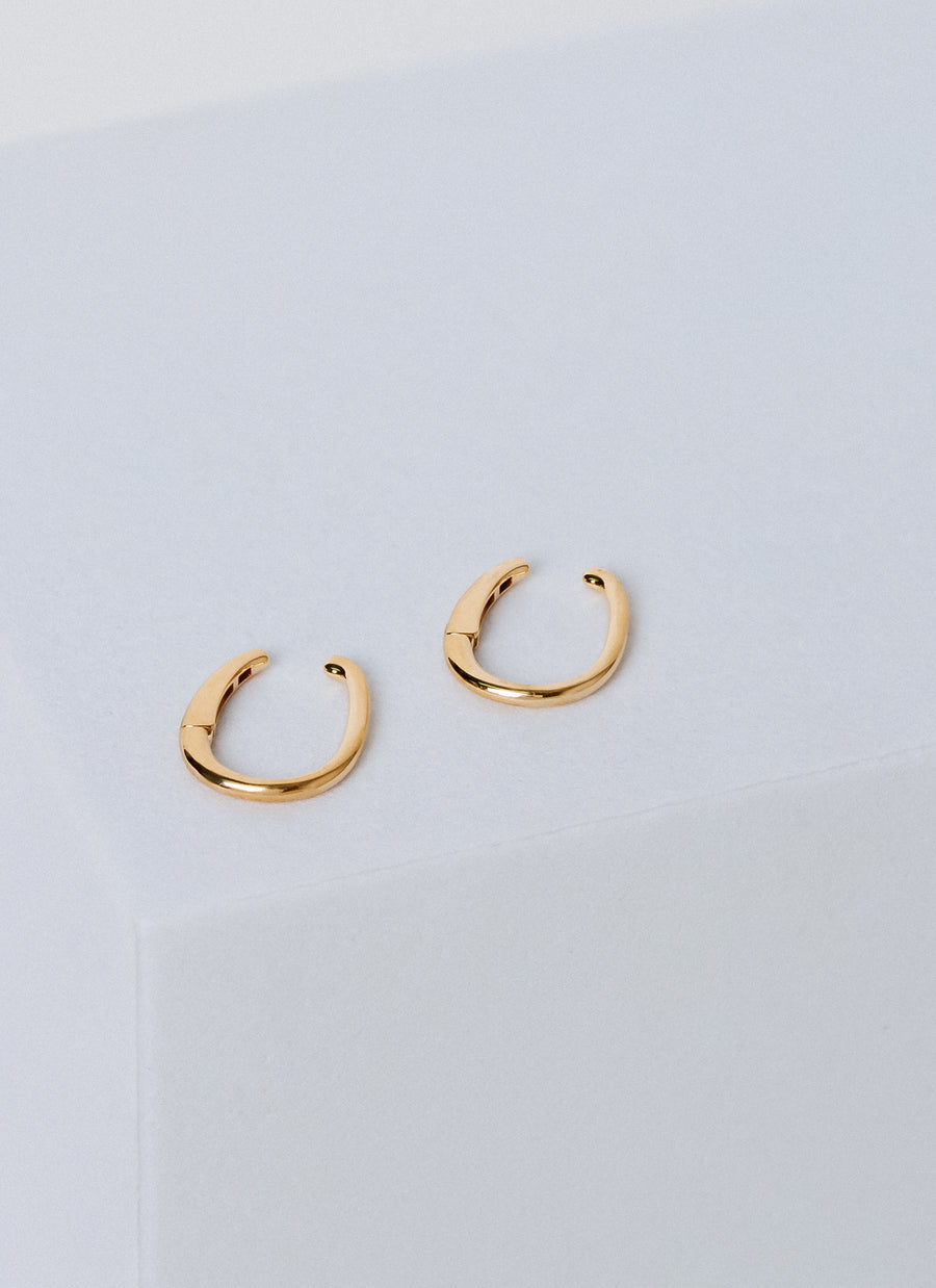 Hinger ear cuffs in 14K recycled yellow gold from RIVA New York, also available in silver and gold vermeil