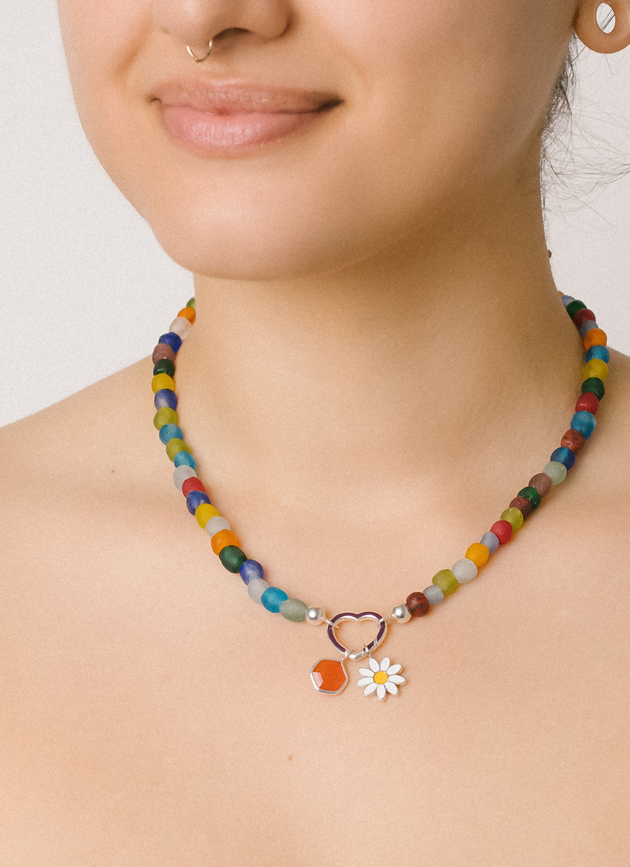 Rebecca wears Luna multicolor recycled glass bead necklace from RIVA New York in sterling silver (heart-shaped Invisible Clasp and charms not included)