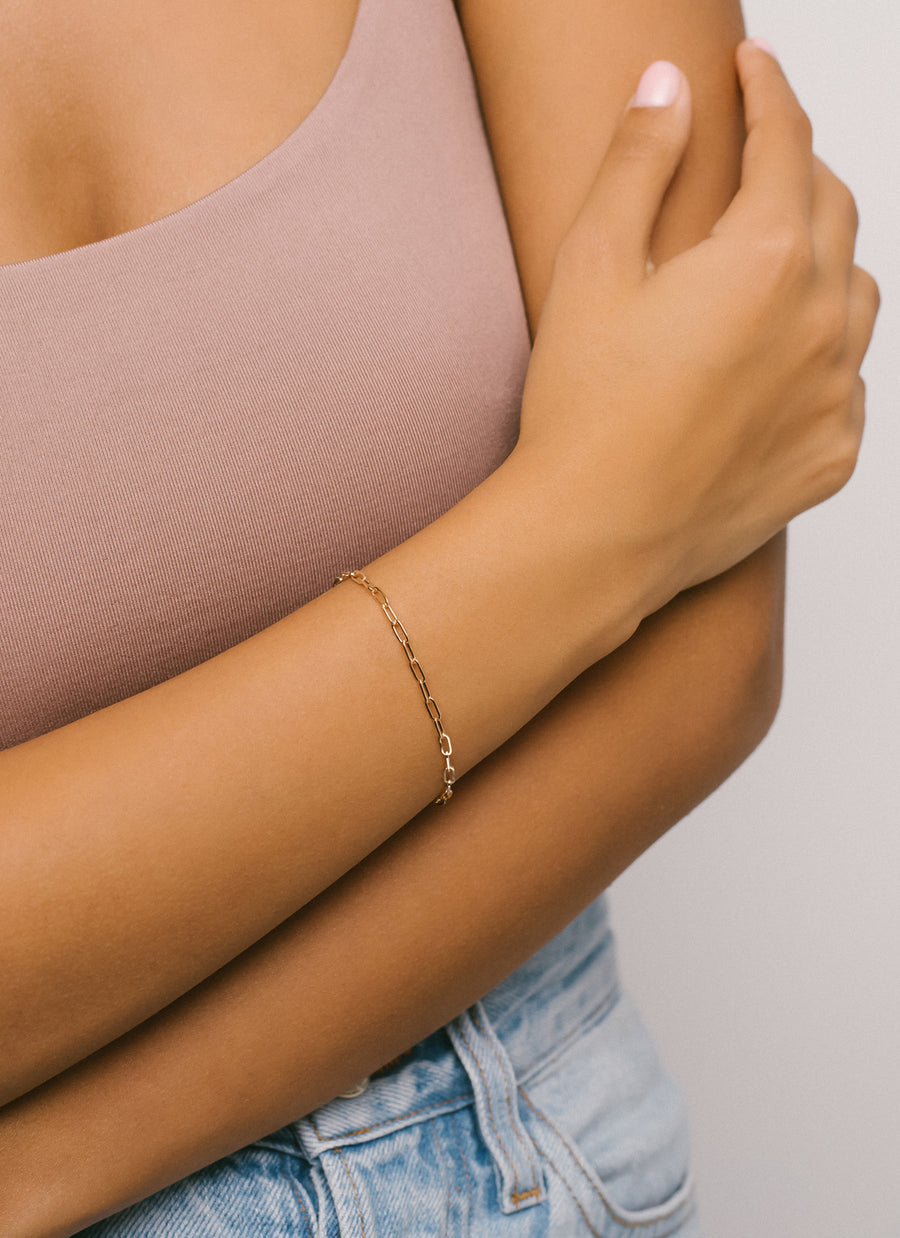 Dainty and delicate yellow gold paper clip chain bracelet from RIVA New York