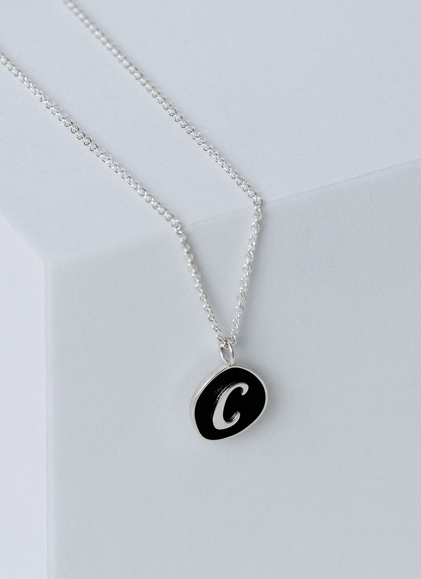 Script Initial on Black Enamel Pendant Necklace from RIVA New York