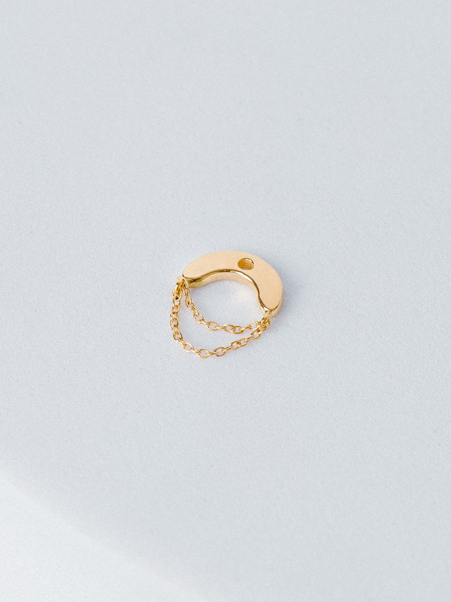 Half moon shaped charm with chains in 14K gold