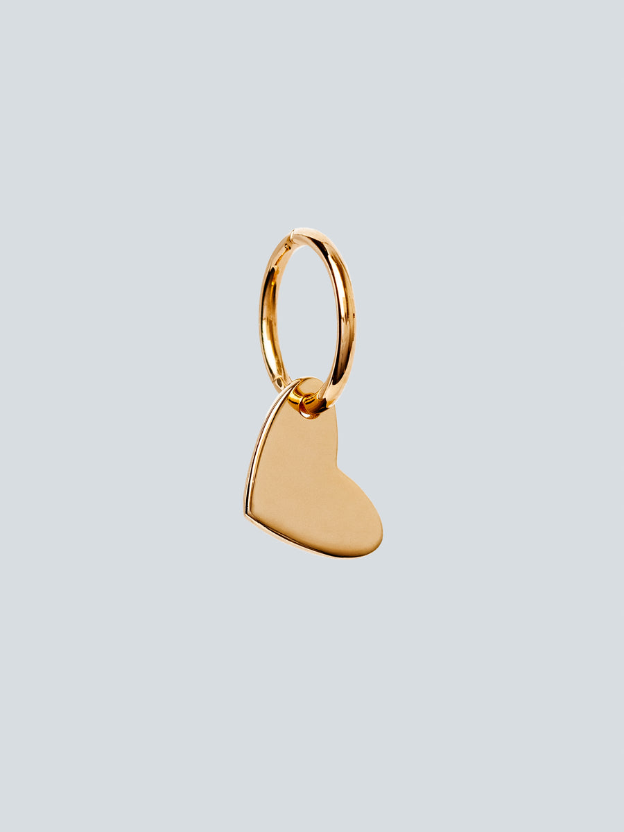 Heart shaped charm in 14K gold with hinged clicker