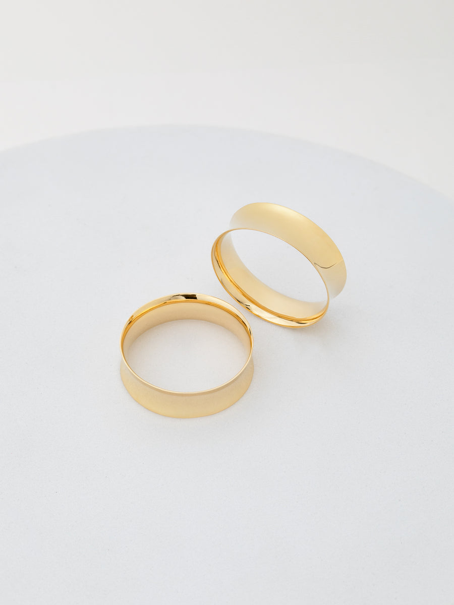 Photo of 1 inch in double flared tunnels in 14k yellow gold from RIVA New York