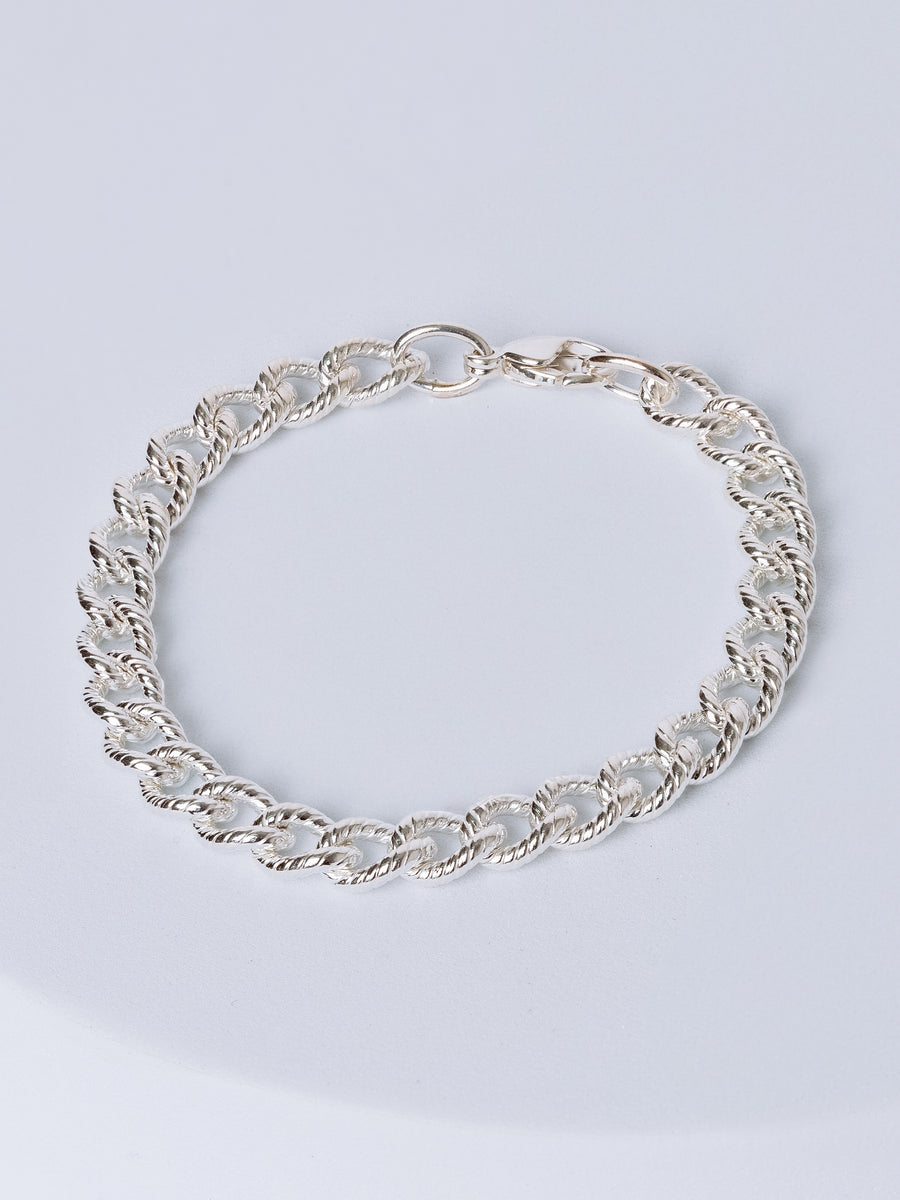 Unisex Textured curb chain bracelet with Lobster Claw Clasp closure from RIVA New York, in sterling silver