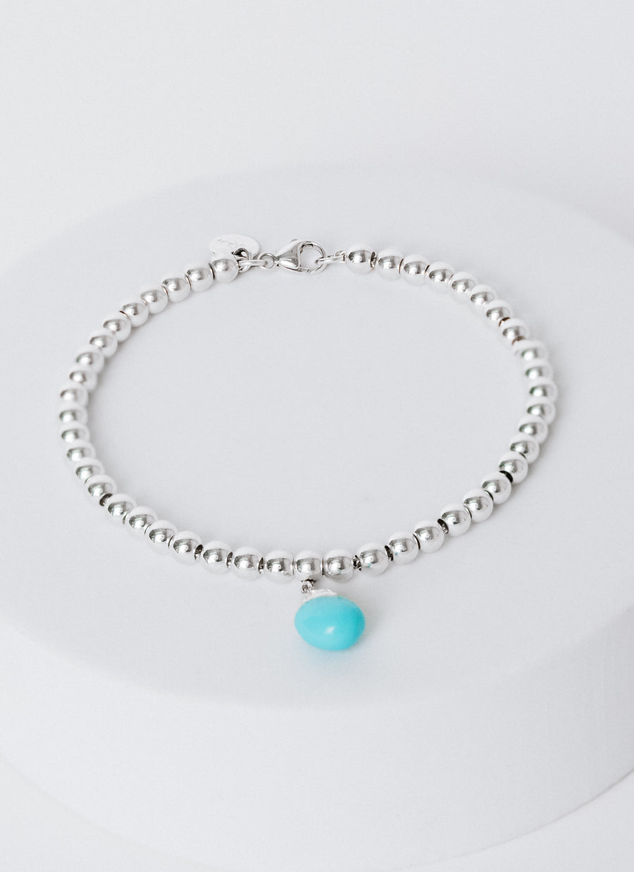 Unique baby blue enamel dipped baroque silver drop charm bracelet form RIVA New York
