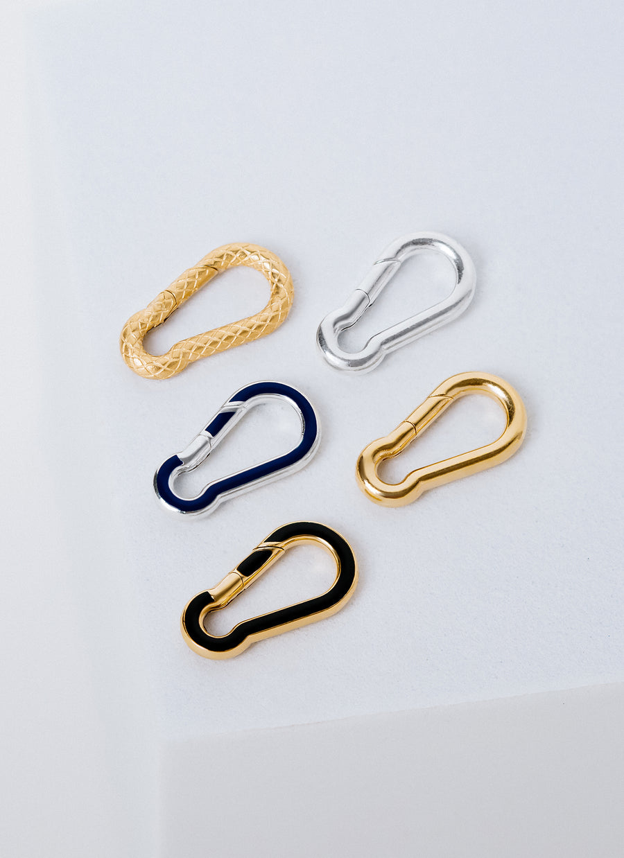 Carabiner-shaped Invisible Clasps for jewelry, comes in plain, textured and enamel versions, only from RIVA New York