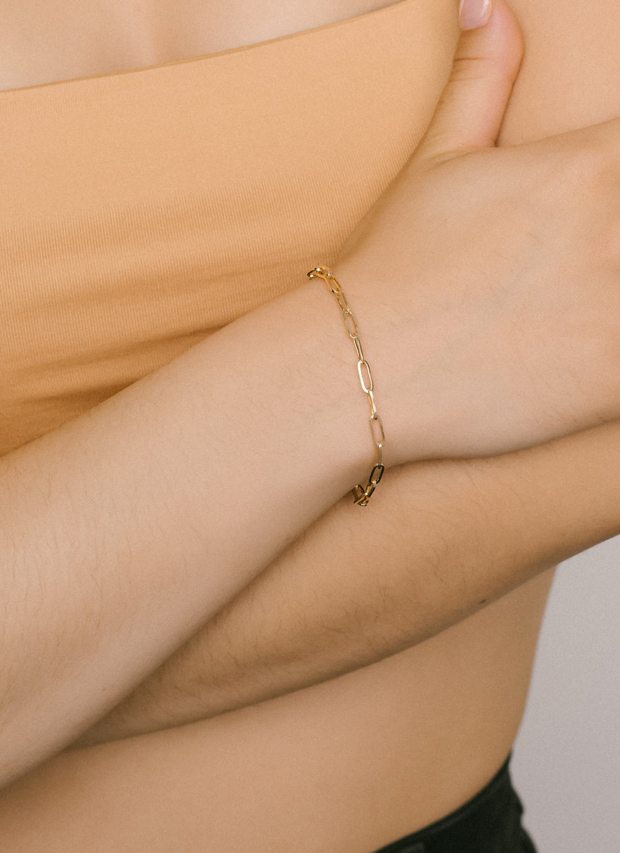 The SoHo paper clip chain bracelet from RIVA New York is made of 14K recycled yellow gold