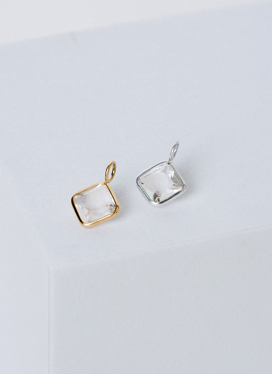 Shop RIVA New York's gemstone charms collection, featuring affordable petite semi-precious stone charms like these clear quartz charms