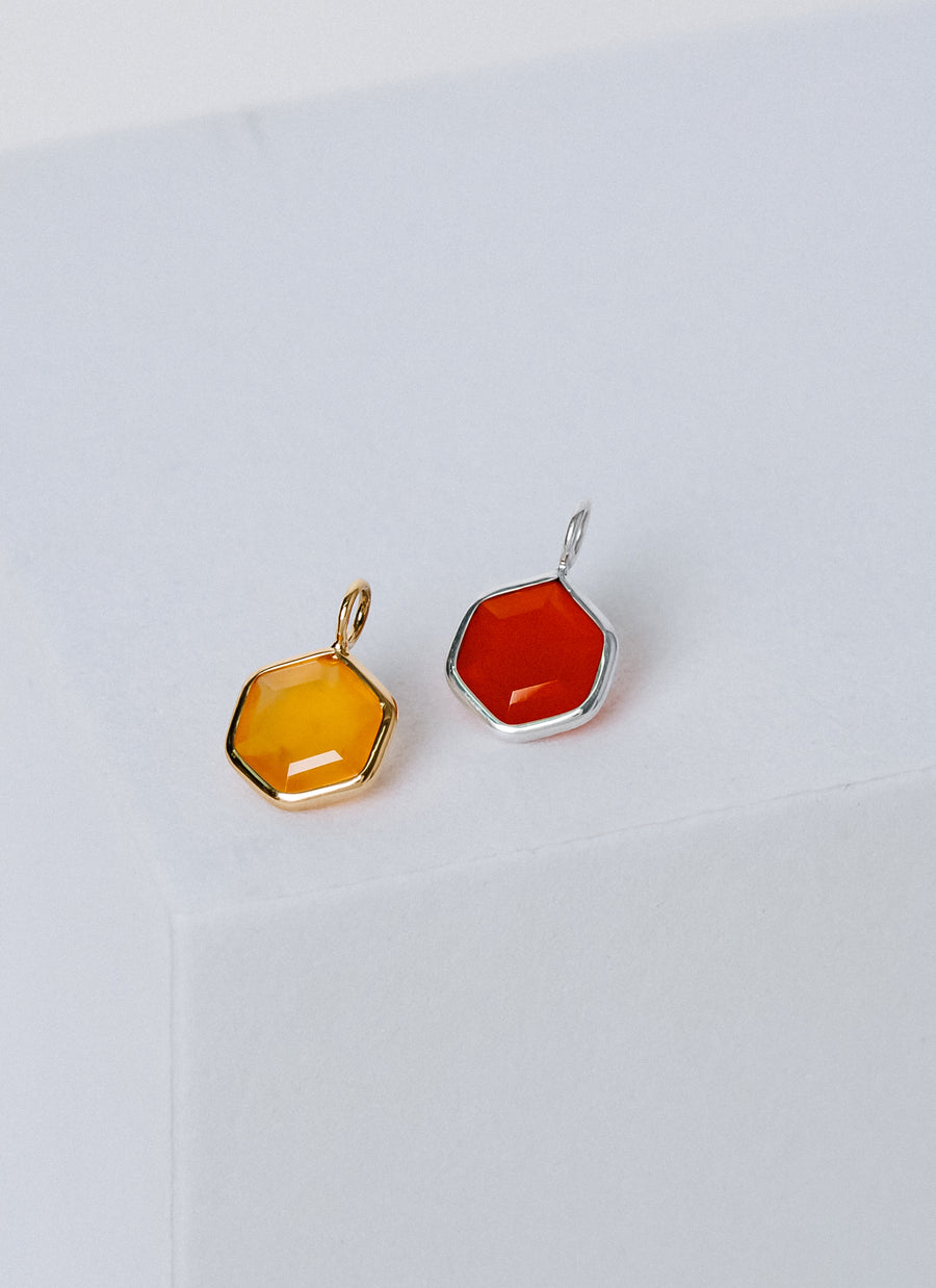 Shop RIVA New York's gemstone charms collection, featuring affordable petite semi-precious stone charms like these carnelian charms