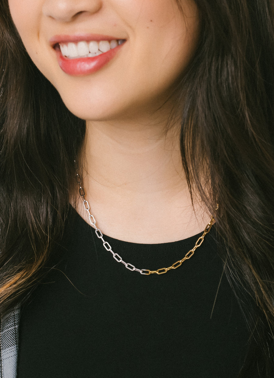 Model wearing the two-tone Astor paper clip chain necklace