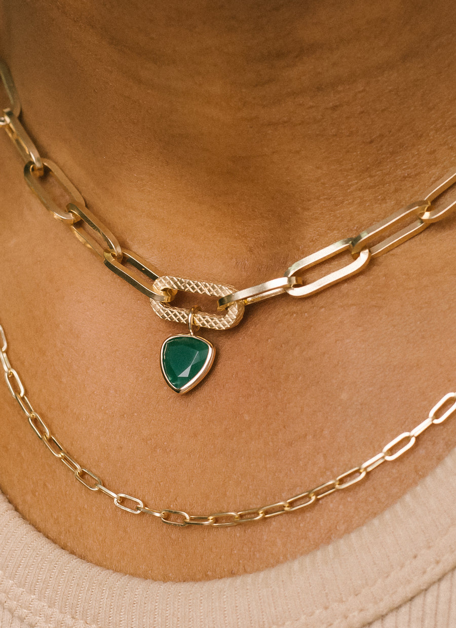 Petite jadeite charm from RIVA New York for modular jewelry lovers, shown here worn as pendant