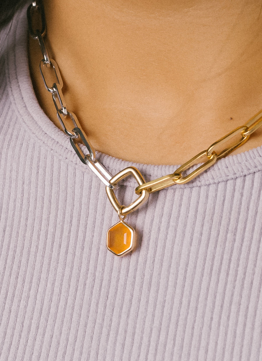 Closeup photo of Carnelian charm from RIVA New York jewelry