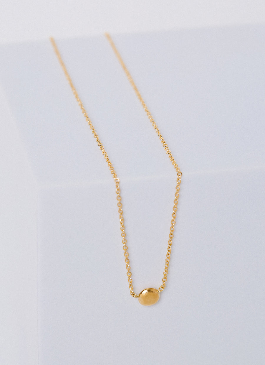 Simple and dainty gold grain necklace from RIVA New York's Fairmined Gold Collection, available in 14K yellow Fairmined Ecological gold, and comes in 3 lengths